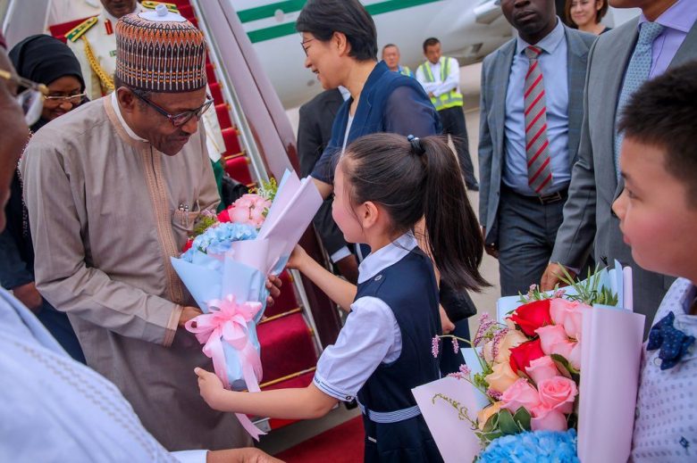 buhari arrives china