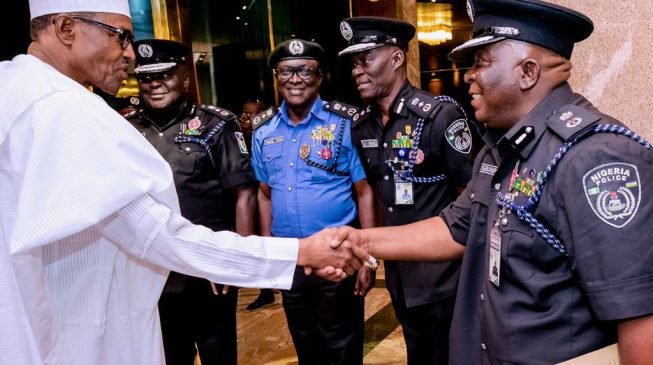 Buhari-and-Police3-653x365