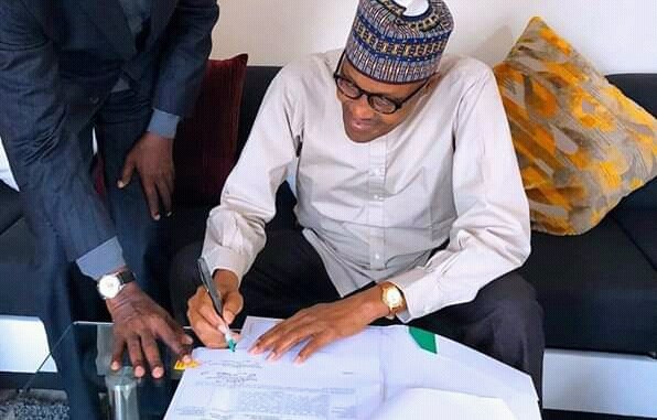 buhari-signs